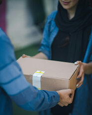 Package being handed over to a customer