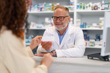 Pharmacist with a patient
